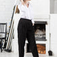 Elegant black trousers with embroidered seams