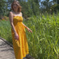 Dzeltena organiskās kokvilnas kleitas uz lencītēm