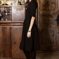 Black dress with circle skirt and separated belt