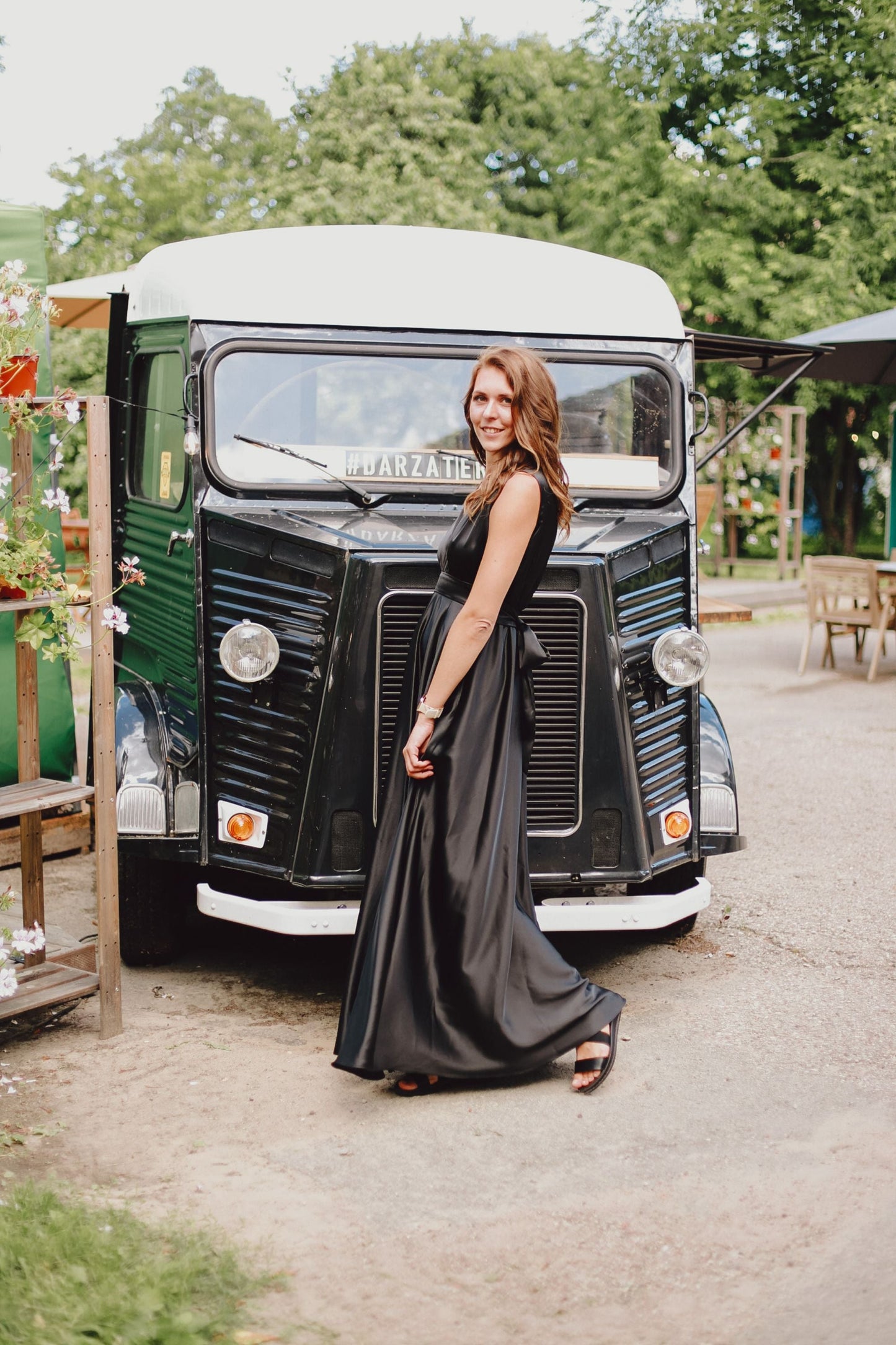 Black dress with a circle skirt and a tie bow
