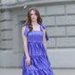 Royal blue satin dress with bows on the shoulders