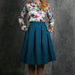Blue-green flared skirts with side pockets
