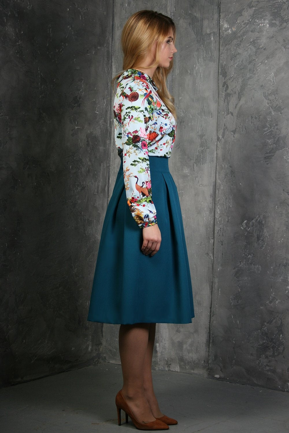 Blue-green flared skirts with side pockets