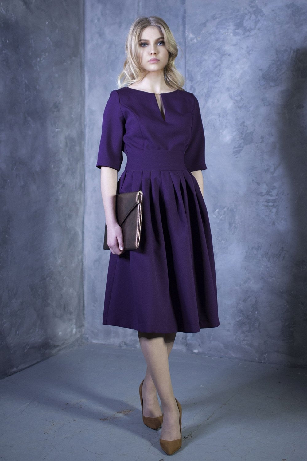 Dark purple dress with pleats. Golden color detail in neckline GUNTINA Dark purple dress with pleats. Golden color detail in neckline GUNTINA