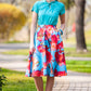 Turquoise circle skirt with side pockets and sakura print