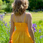 Dzeltena organiskās kokvilnas kleitas uz lencītēm
