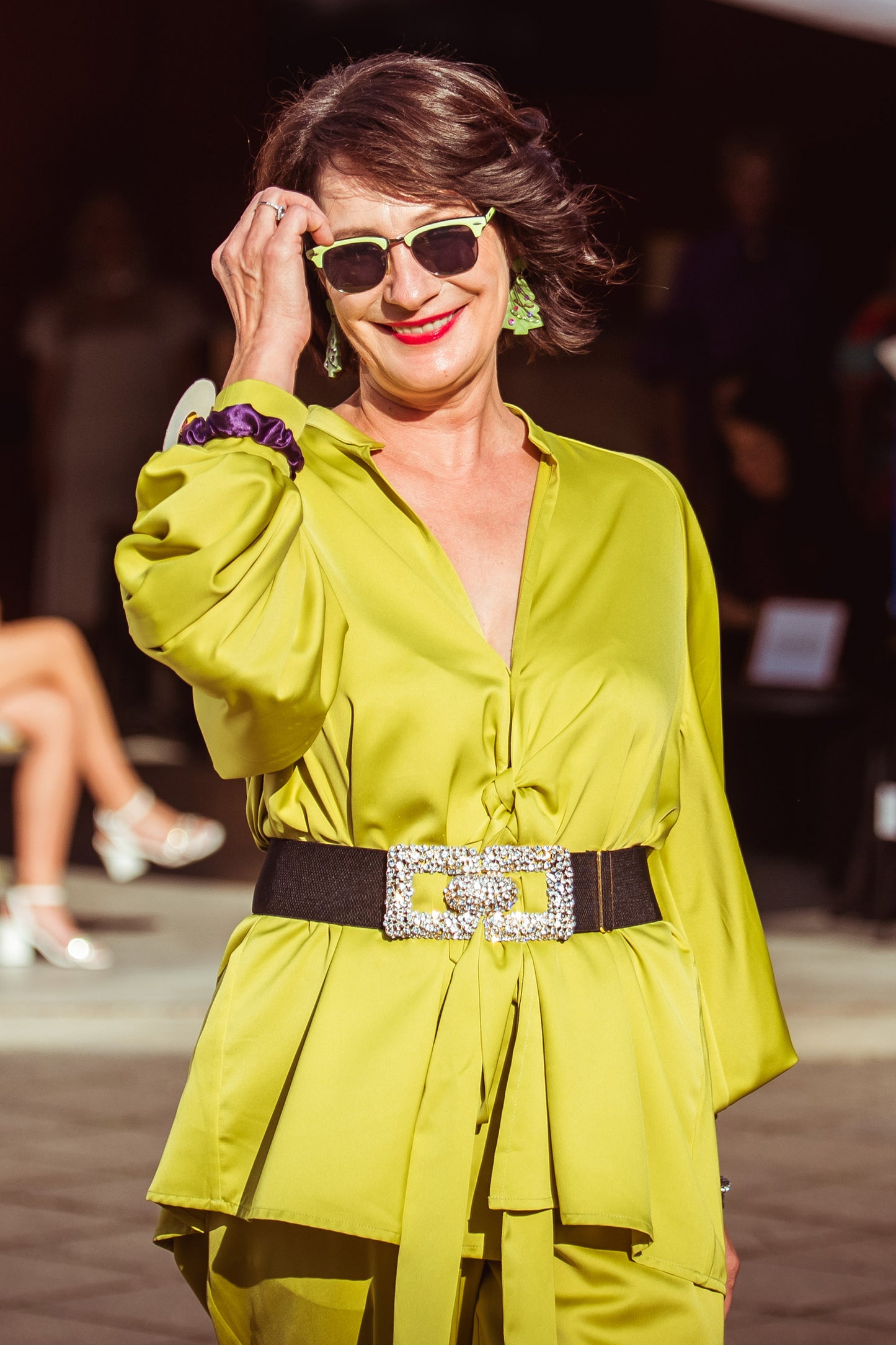 Olive green satin blouse with a belt