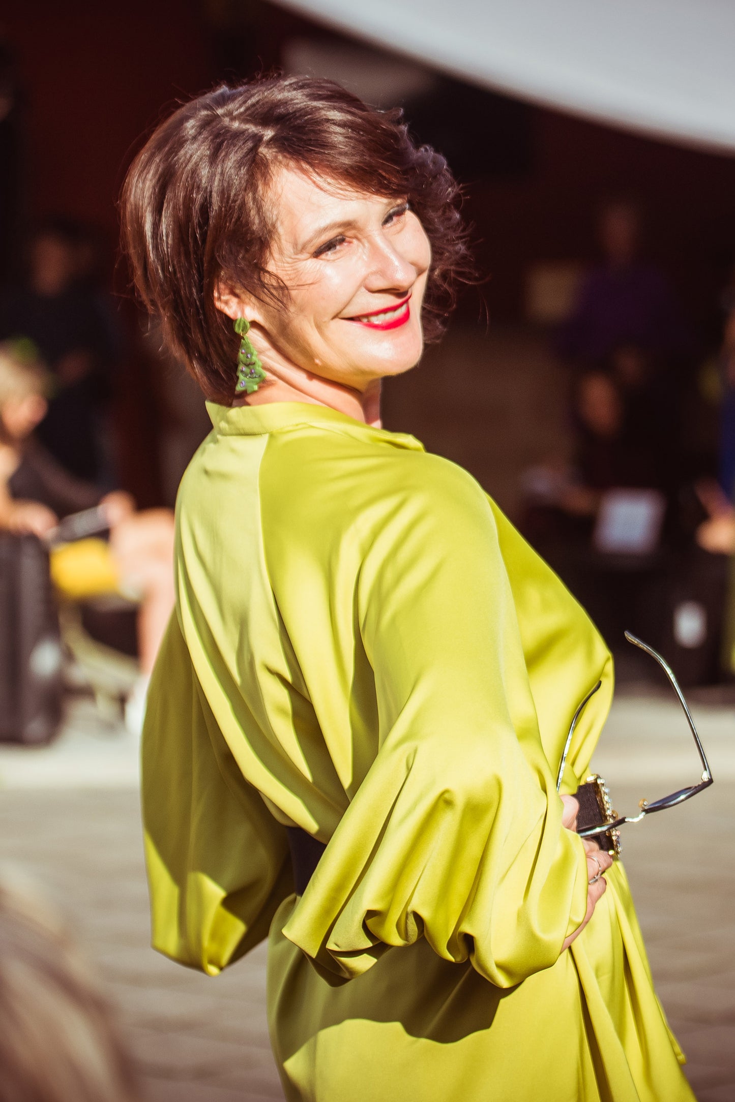 Olive green satin blouse with a belt