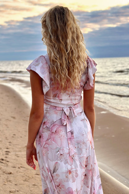 Pink floral viscose dress, back view with waist bow