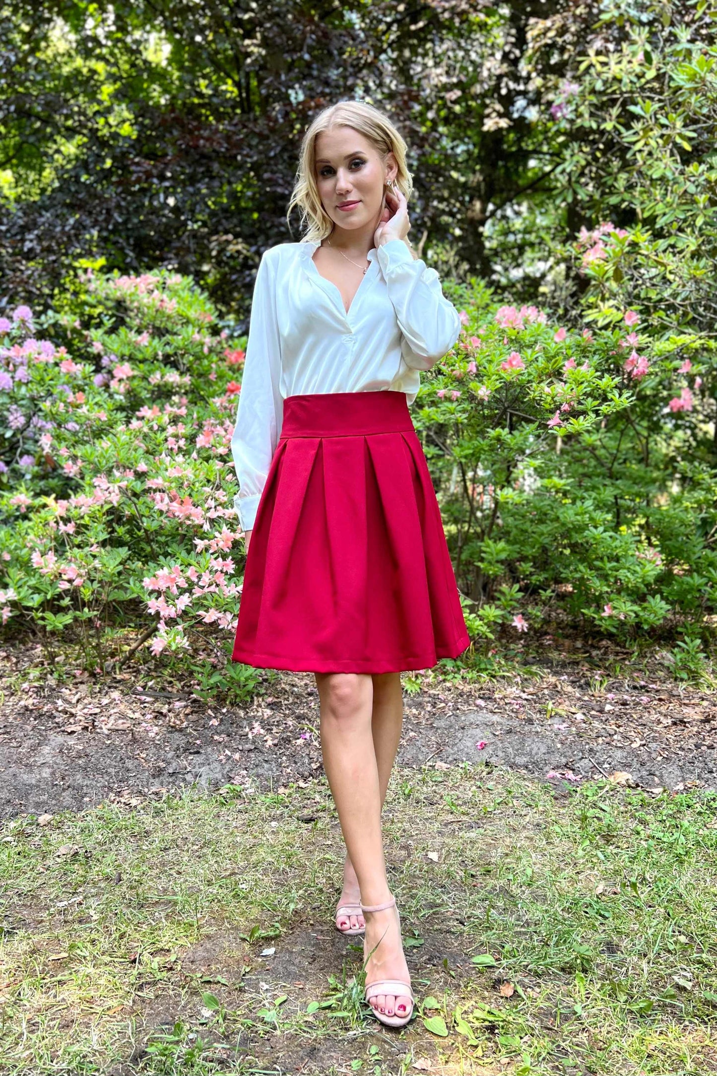 Pleated mini skirt with pockets