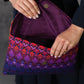 Handtasche mit bunten violetten Rauten 