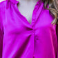 Bright satin blouse with V cut neckline