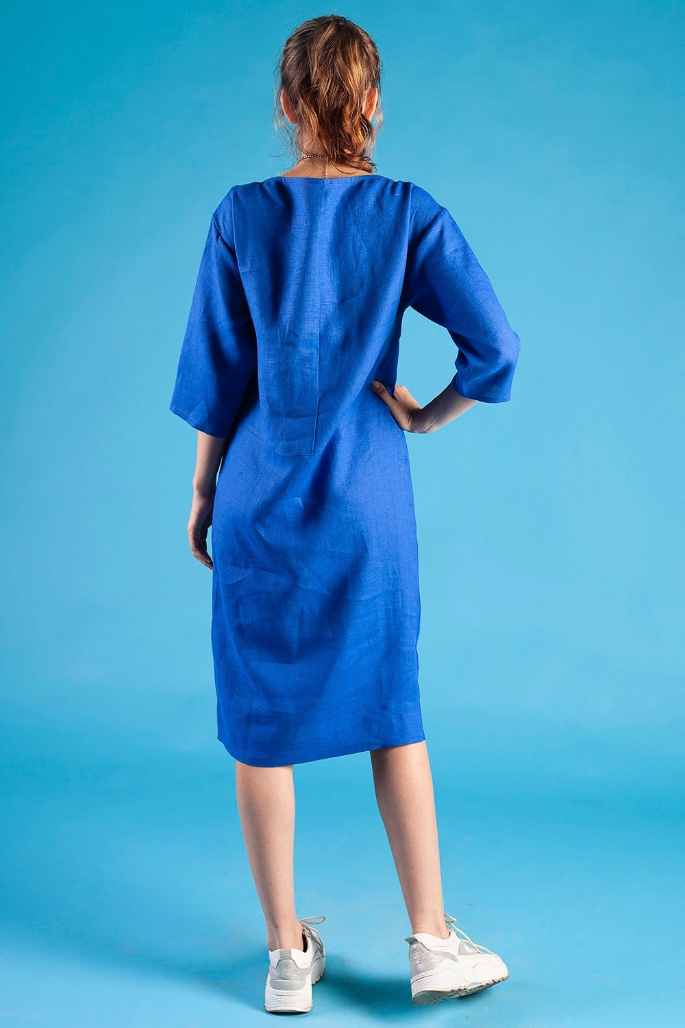 Blue linen dress with front pockets