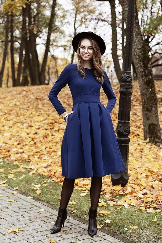 Dark blue dress with side pockets and belt