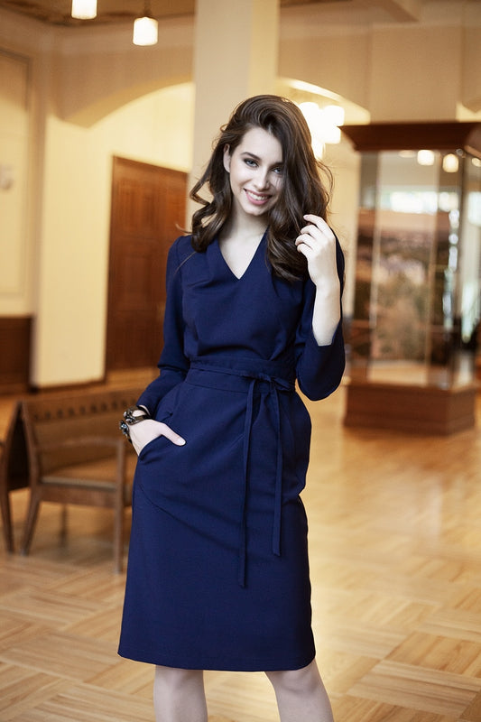 Dark blue dress with side pockets and belt