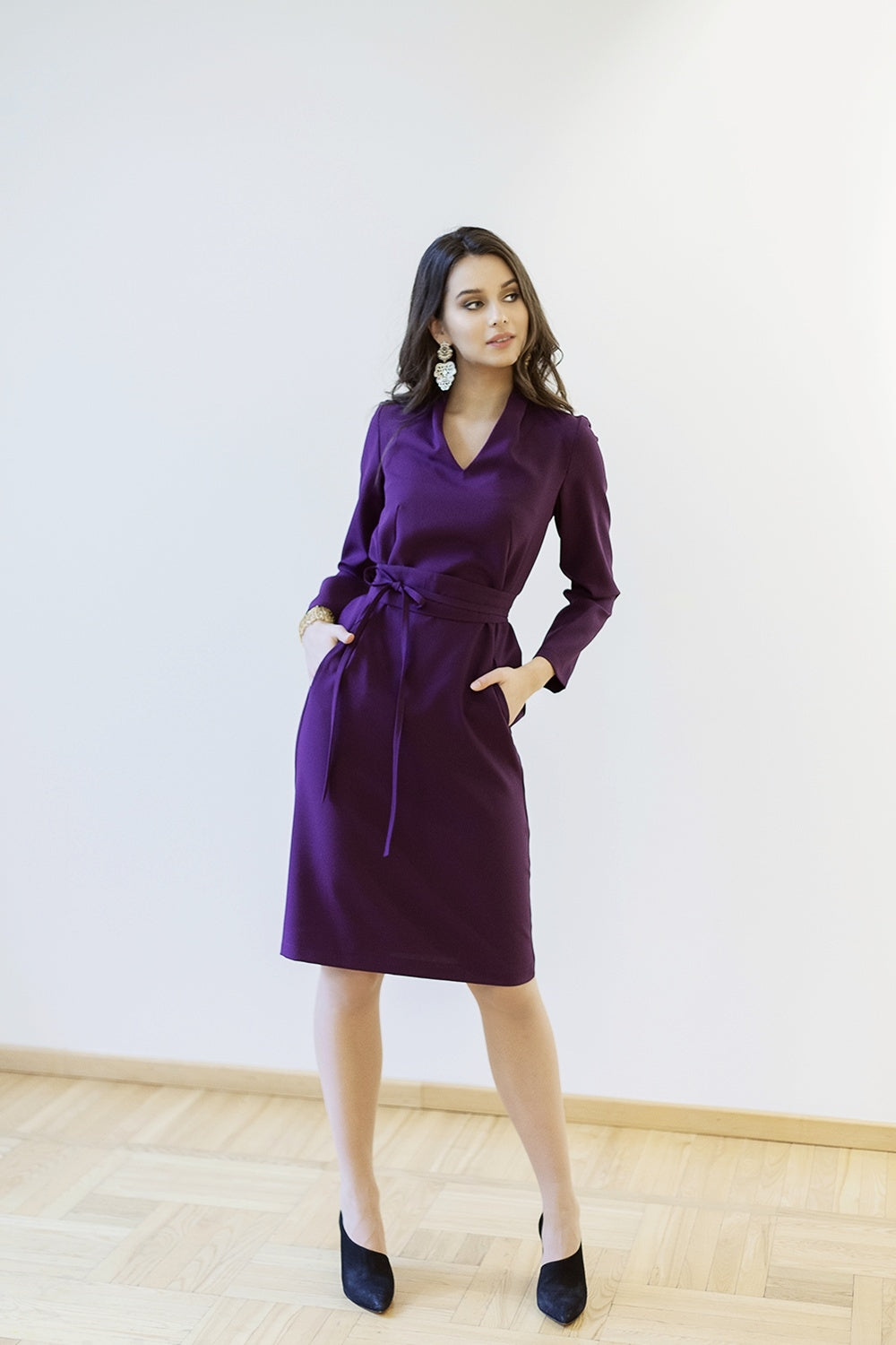 Dark purple dress with side pockets and belt