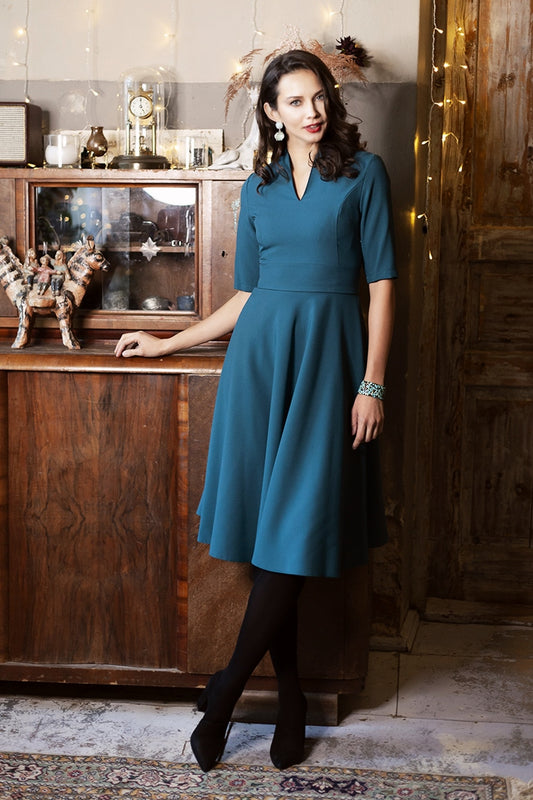 Blue green dress with circle skirt and separated belt