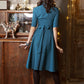 Blue green dress with circle skirt and separated belt