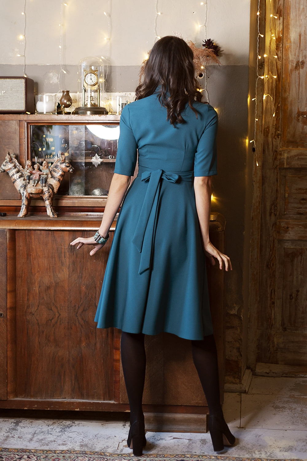 Blue green dress with circle skirt and separated belt