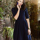 Dark blue maxi dress with pleats and separated belt