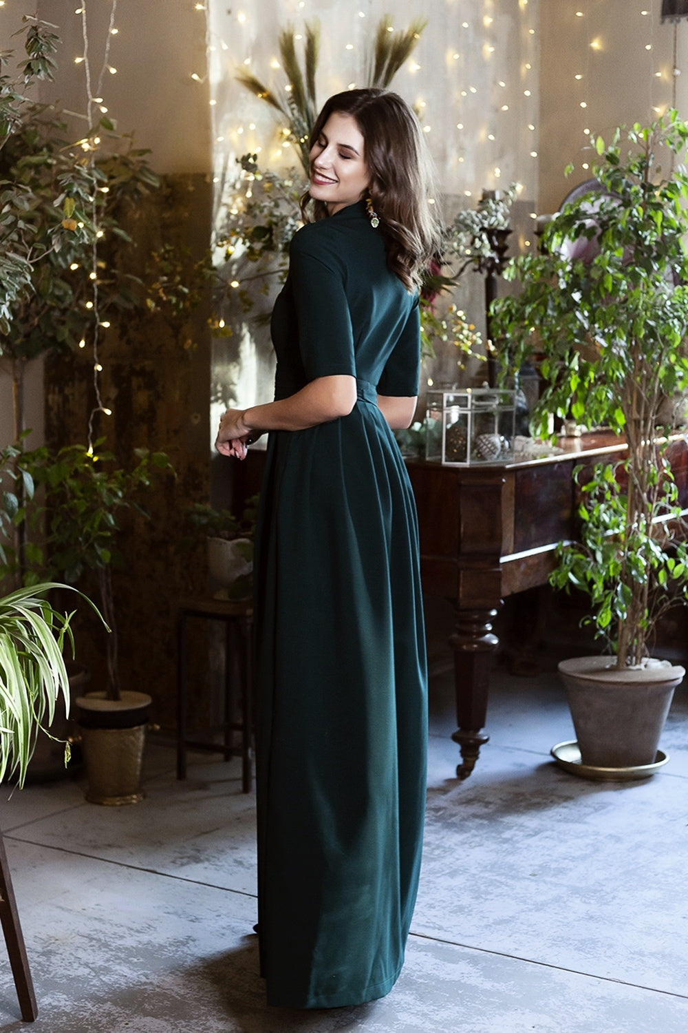 Dark green maxi dress with pleats and separated belt