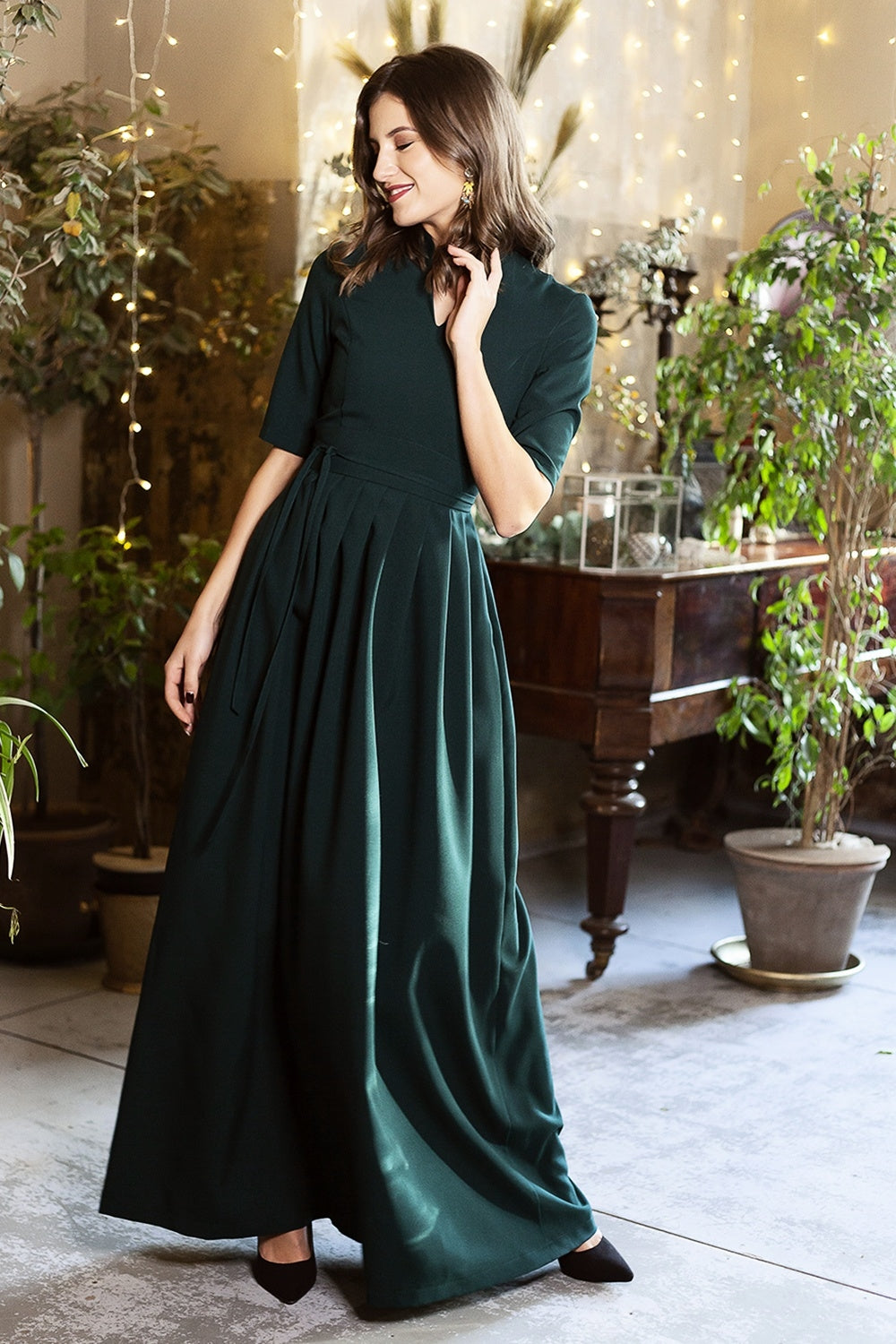 Dark green maxi dress with pleats and separated belt
