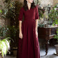 Dark red maxi dress with pleats and separated belt