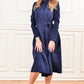 Dark blue dress with collar and front buttons