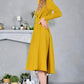 Mustard yellow dress with stand up collar and front buttons