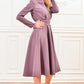 Dress with stand up collar and front buttons