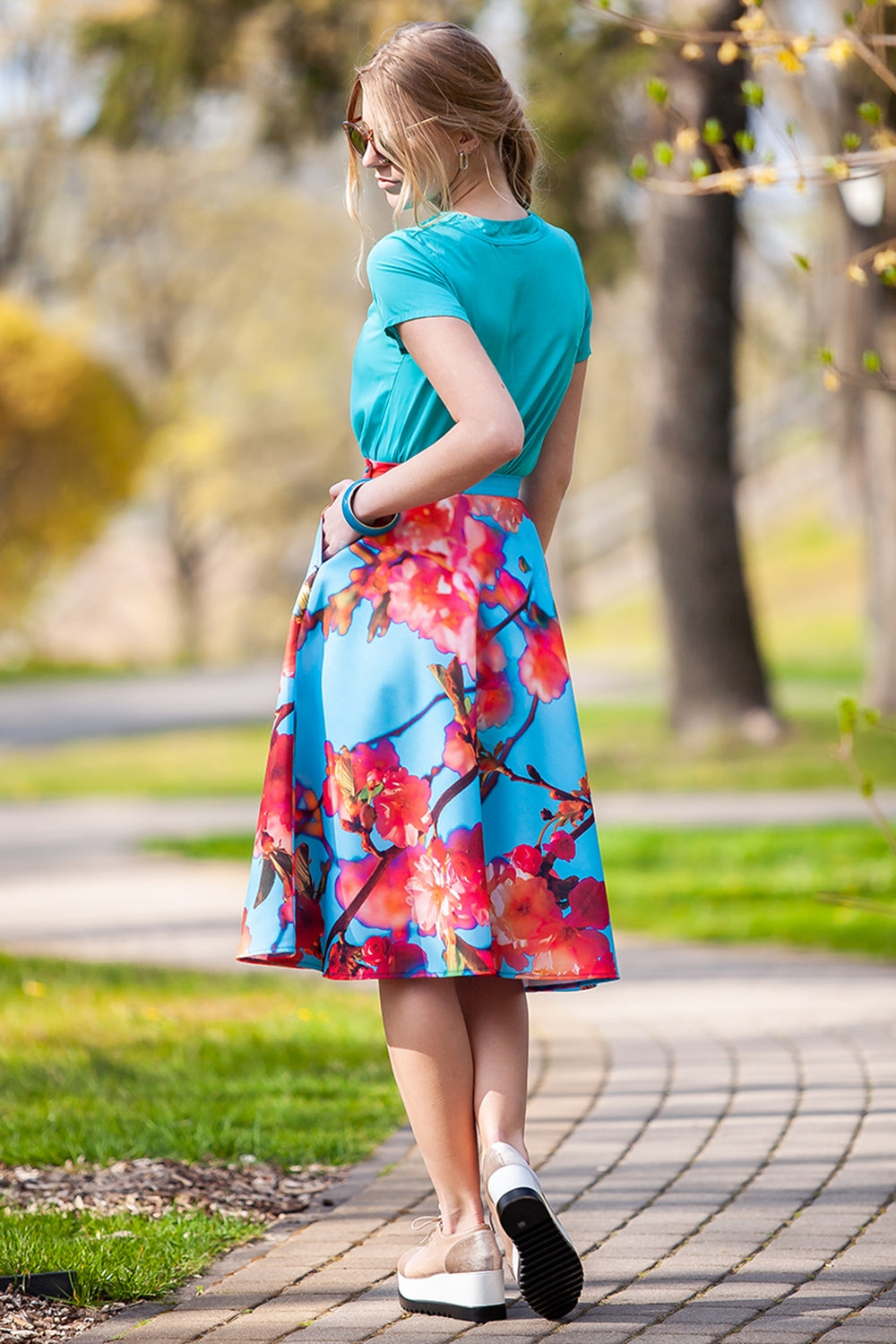 Turquoise circle skirt with side pockets and sakura print