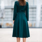 Dark green dress with collar and front buttons