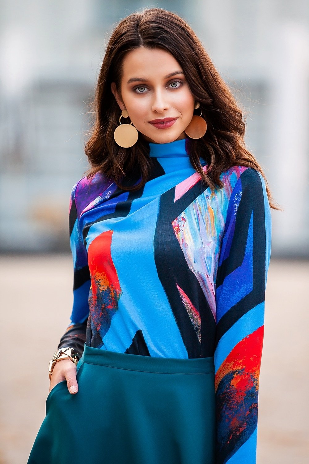 Blouse with abstract lines and high neckline