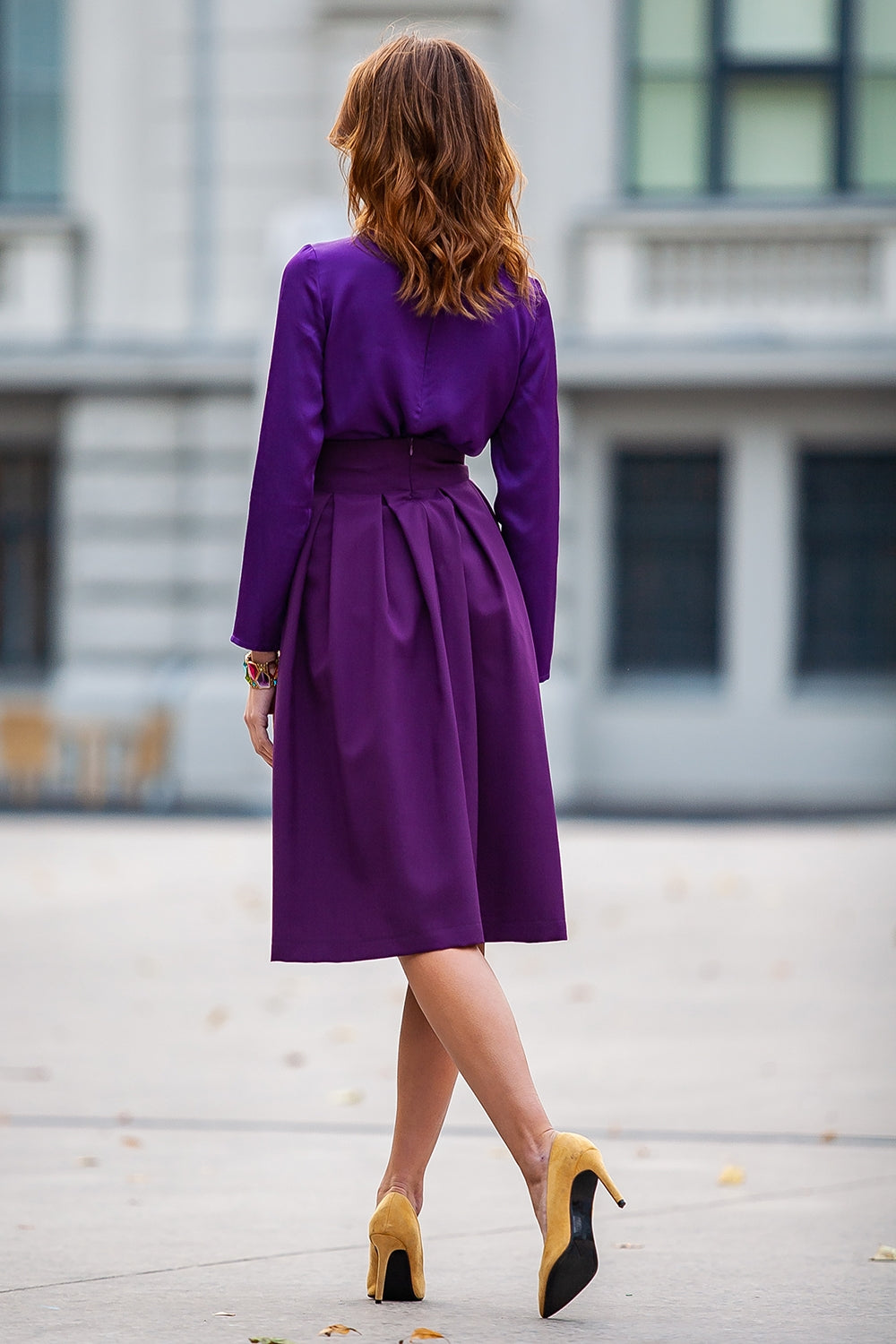 Dark purple flared skirts with side pockets