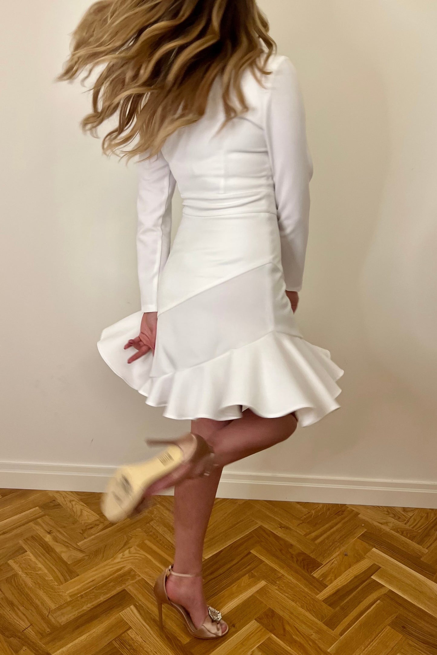 White mini dress with ruffle