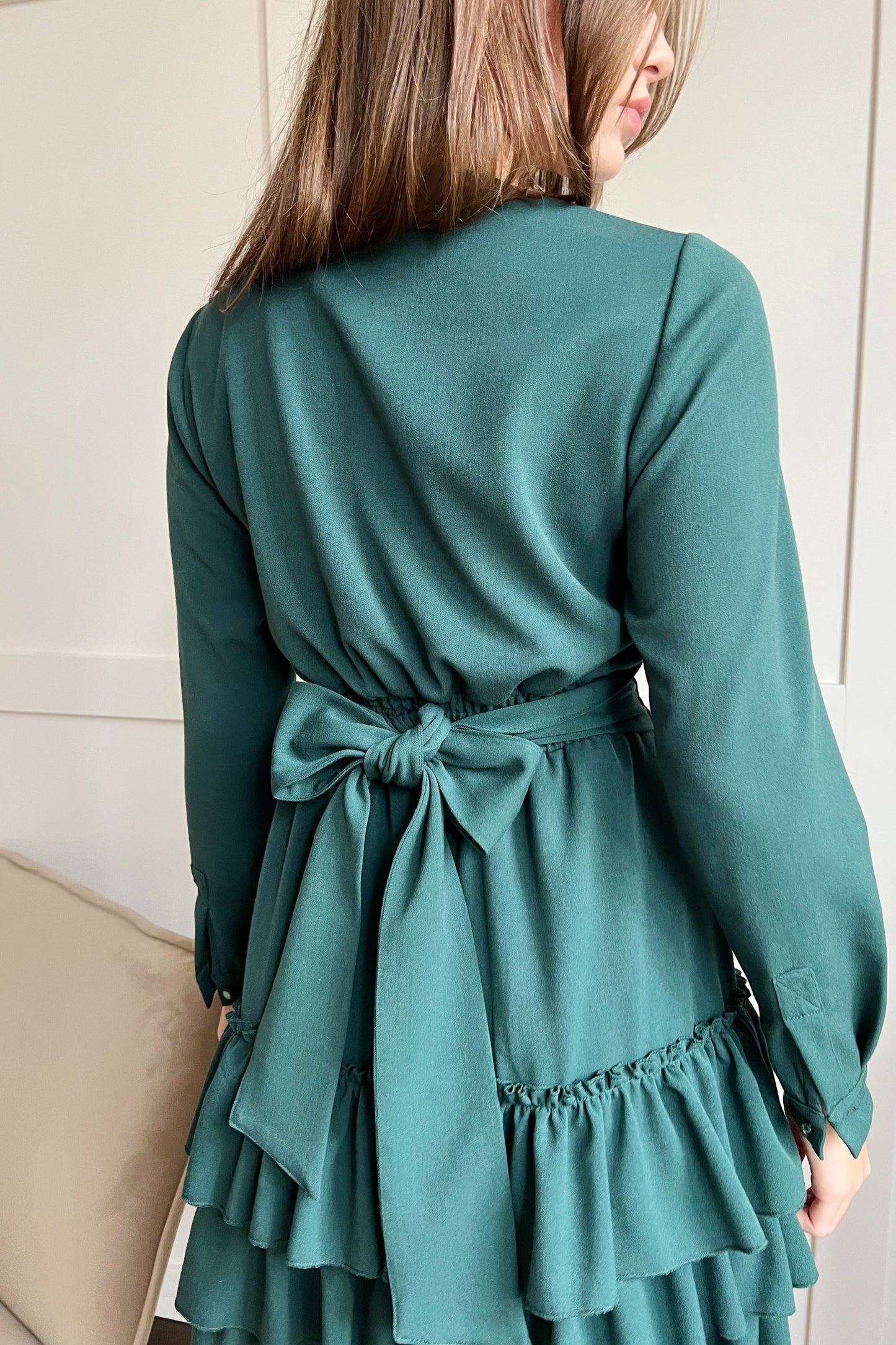 Green autumn dress with ruffles
