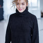 Black half-length sweater made of wool fabric