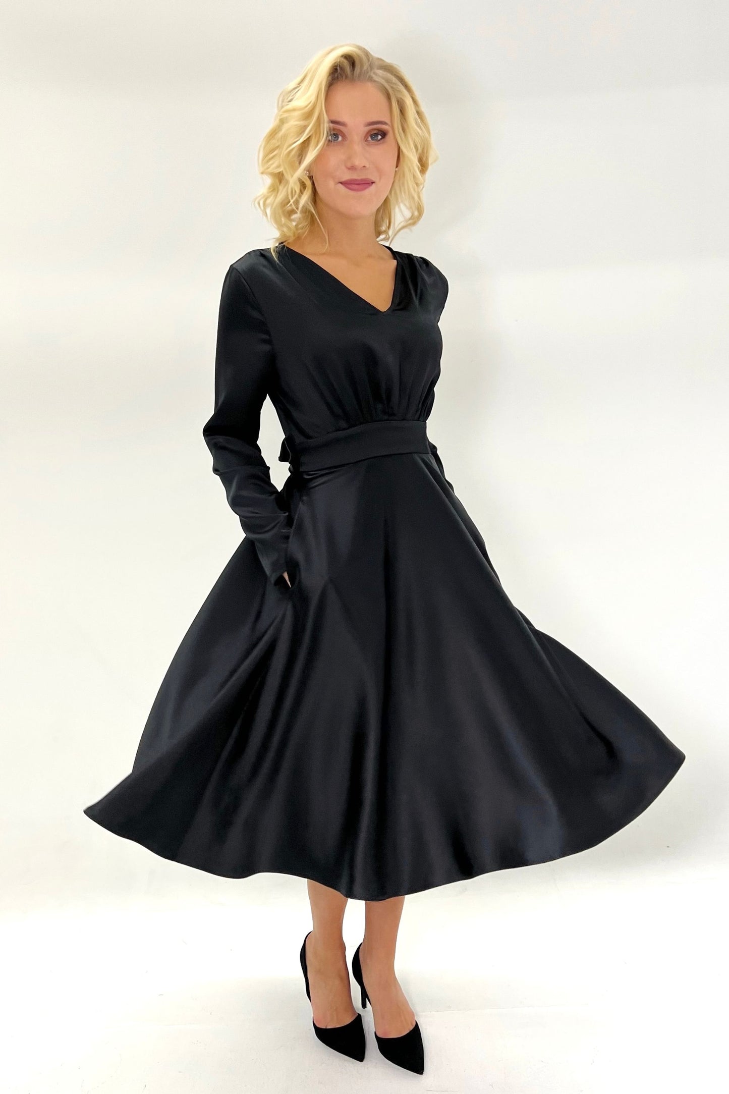 Black cocktail dress with sleeves
