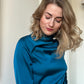 Blouse with pleats on shoulder