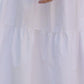 Balta kokvilnas kleita ar bantēm