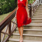 Red half-length cocktail dress with a bow