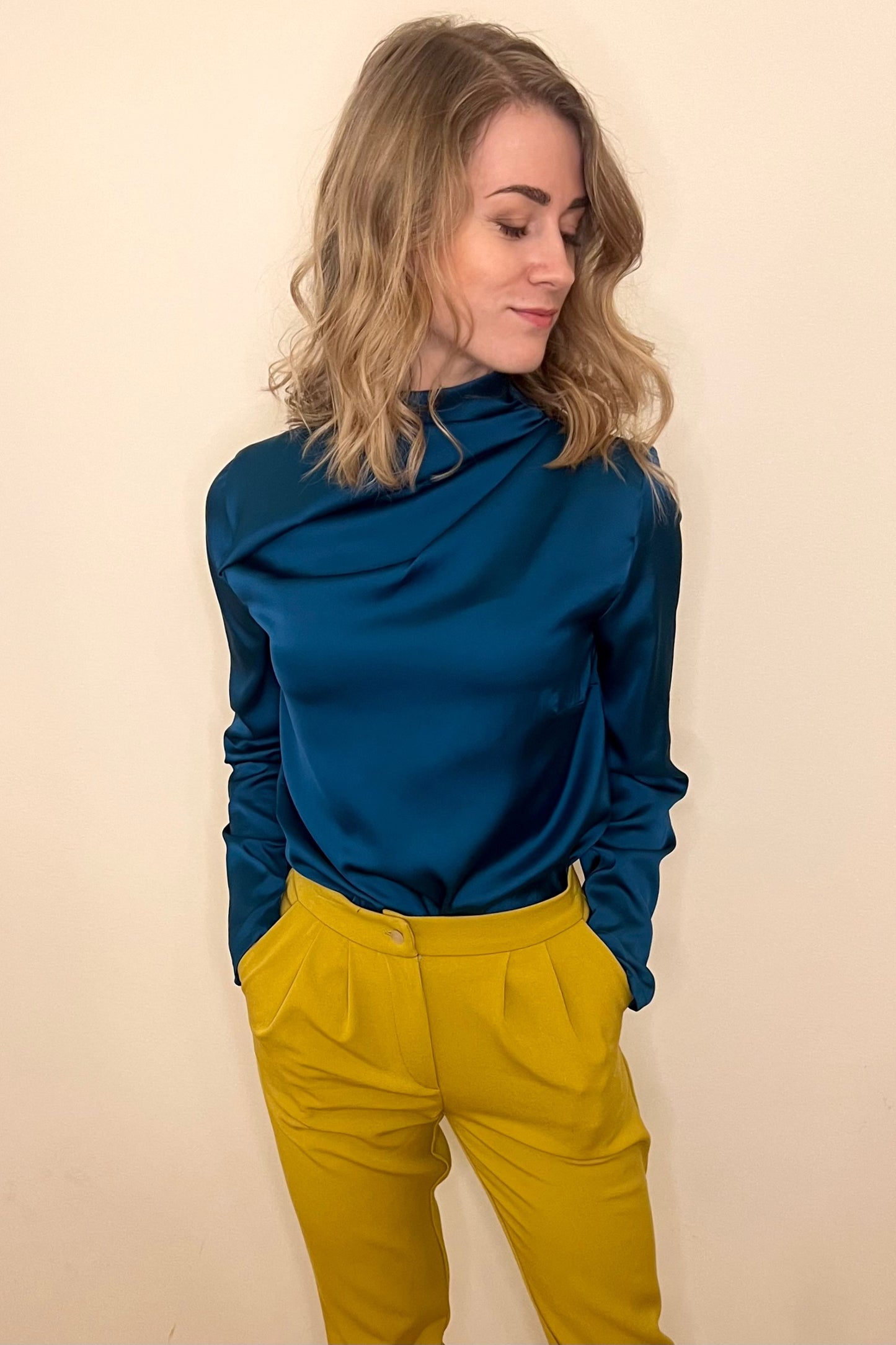 Blouse with pleats on shoulder