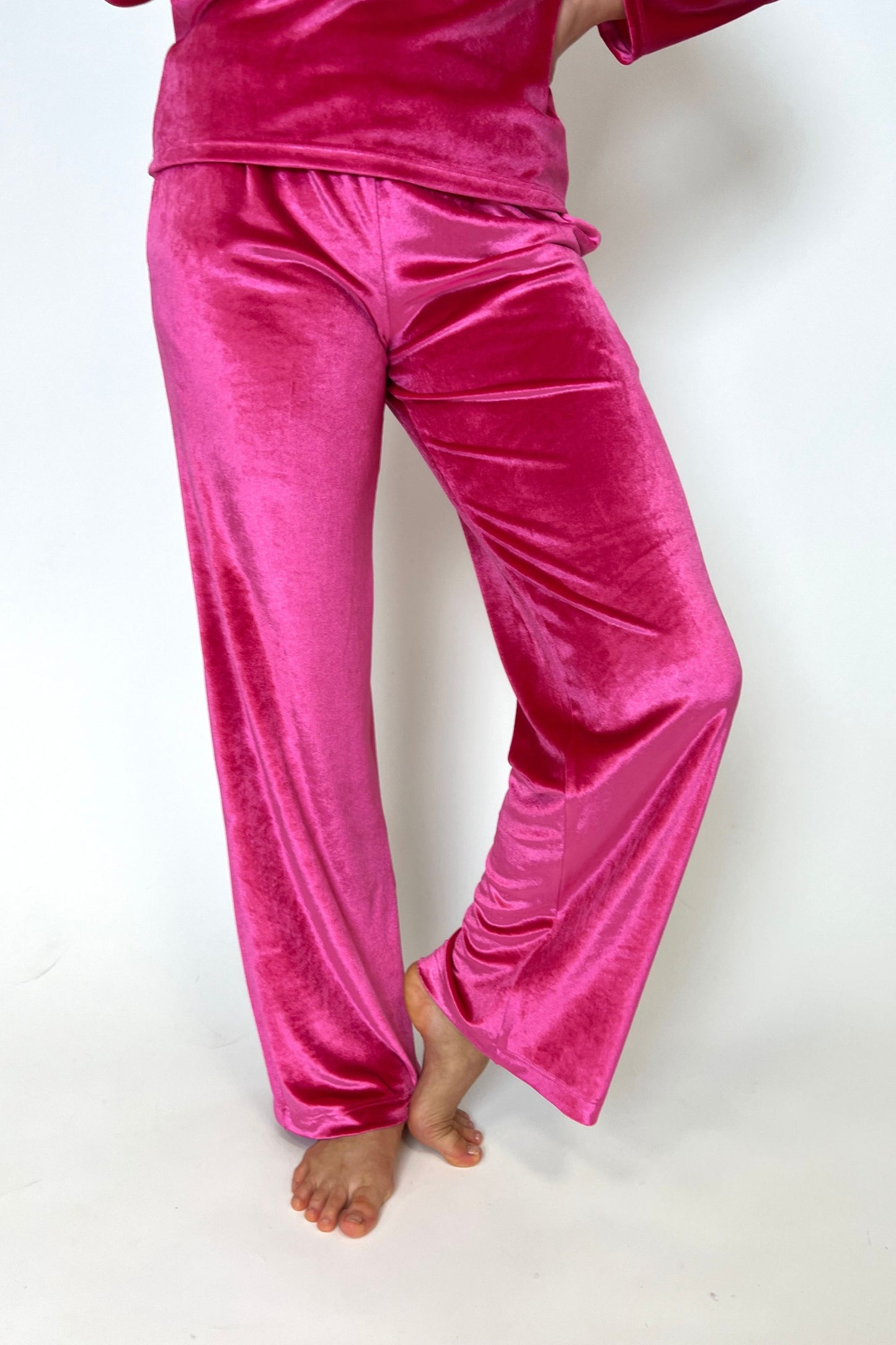 Pink velvet trousers with pockets