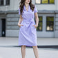 Loose fit dress with side pockets and belt