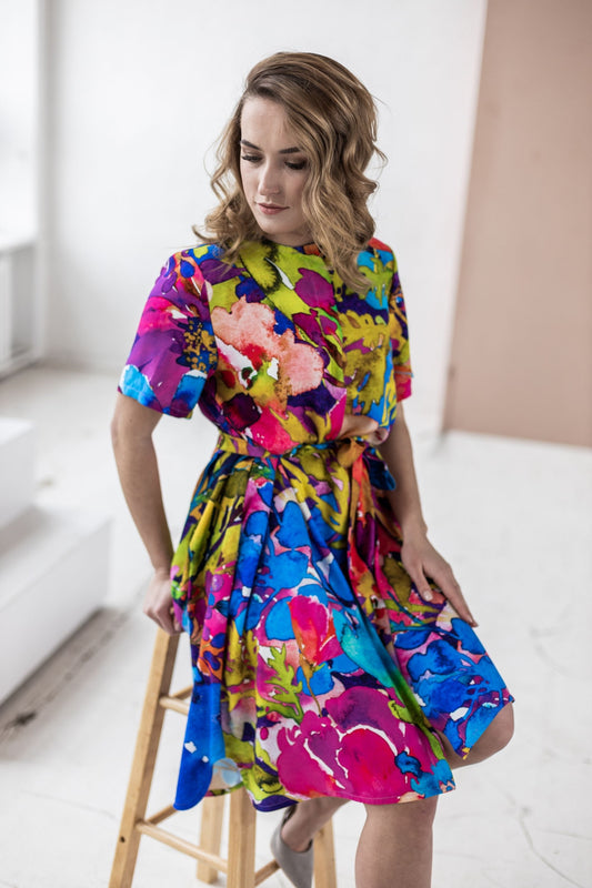 Short and wide summer dress with bright floral print