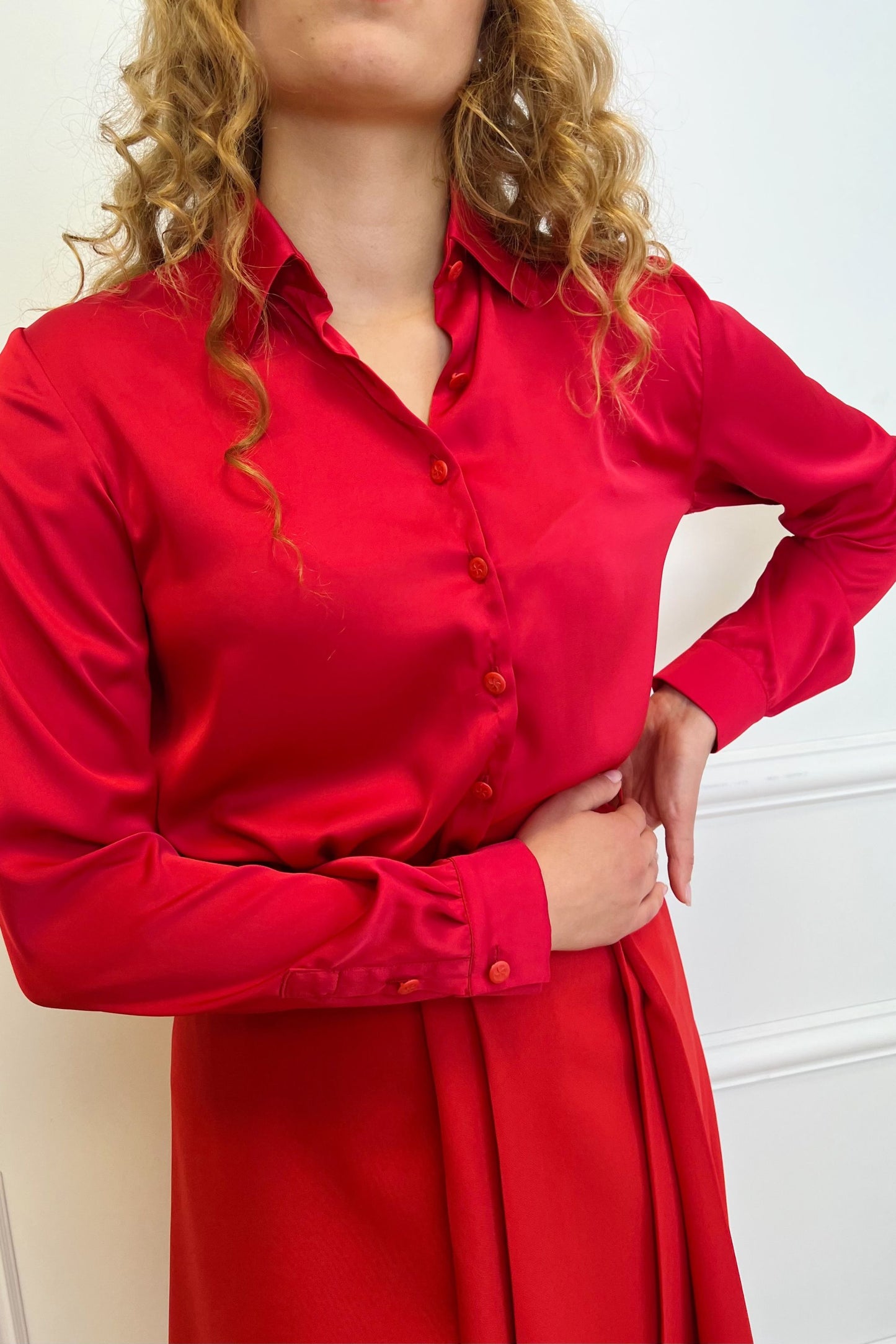 Red skirt with pleats on one side