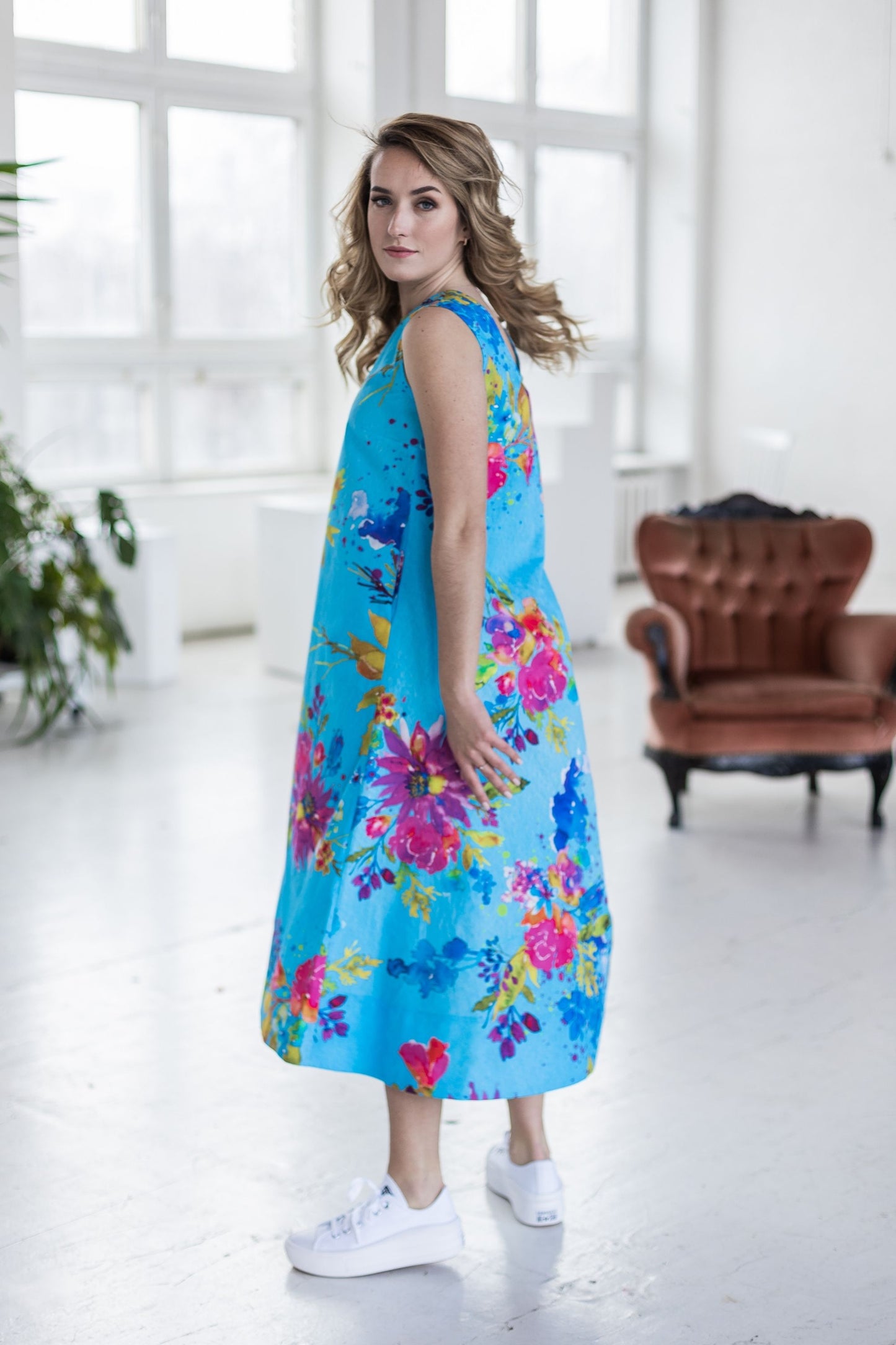 Simple bell dress with pockets, bright blue with flowers