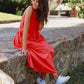 Coral midi length summer dress with ruffles