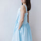 Light blue midi length summer dress with ruffles