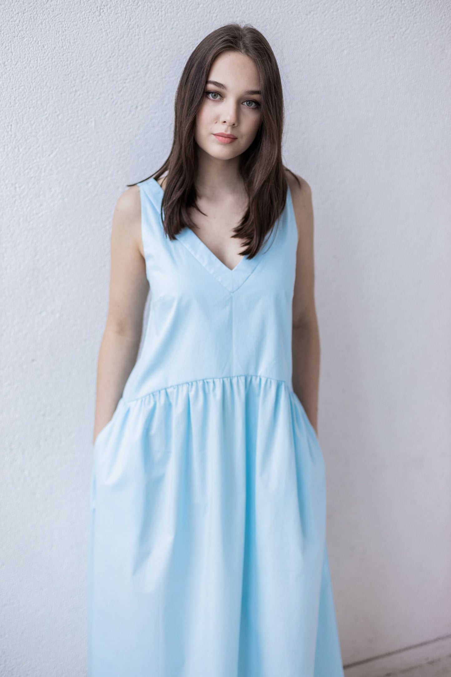 Light blue midi length summer dress with ruffles